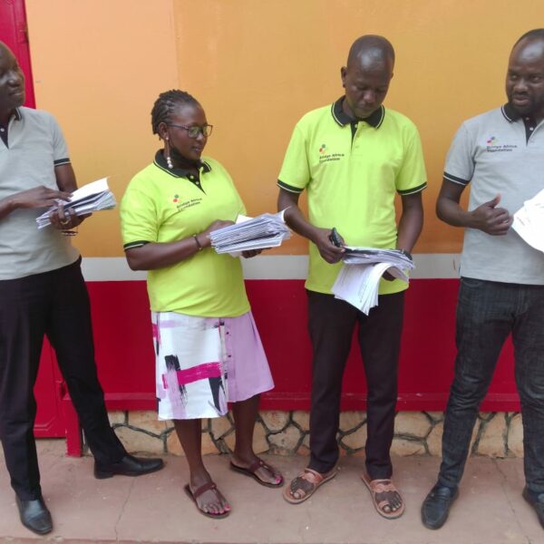 Delivering of reading books to Etiquette Uganda
