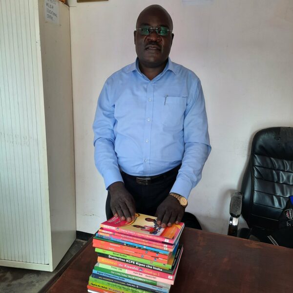 Director Elisha of Welicar school, Kenya with books received